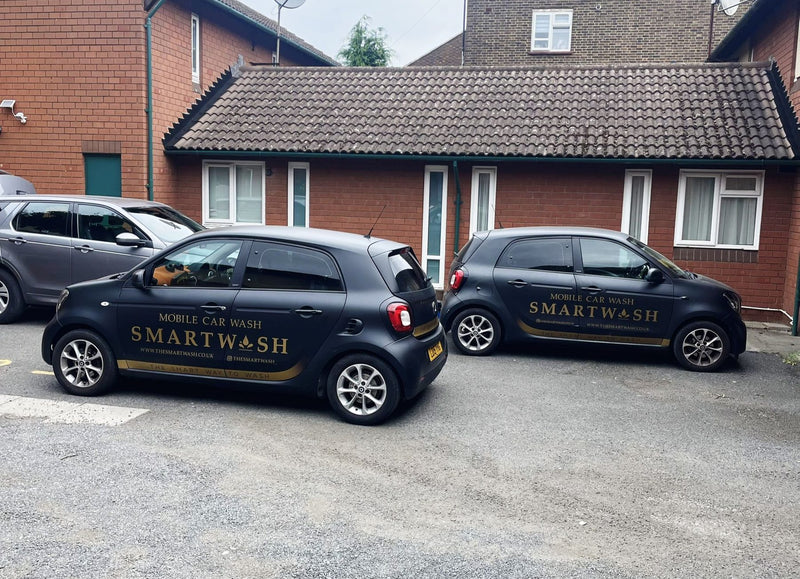 Two SmartWash cars ready for mobile washes