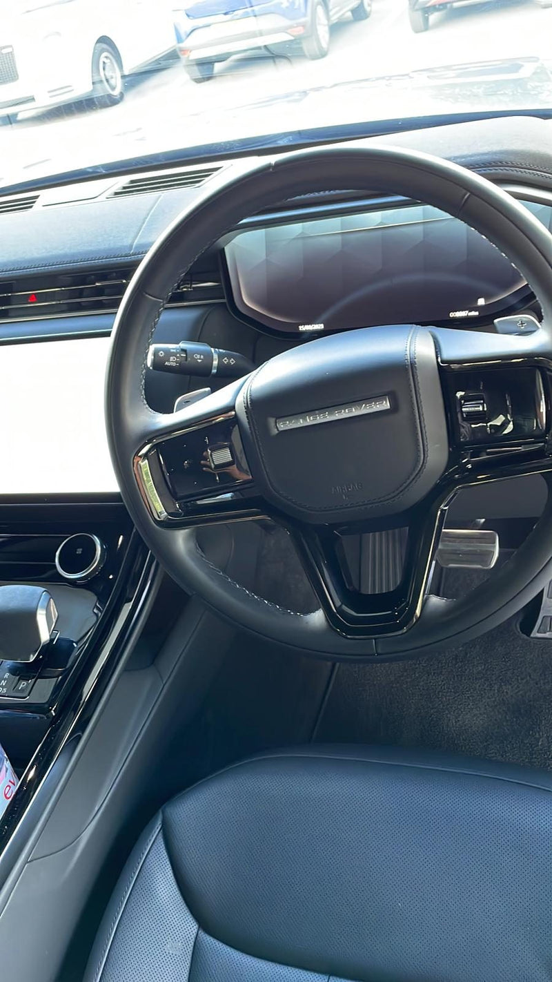 Clean Range Rover interior and steering wheel